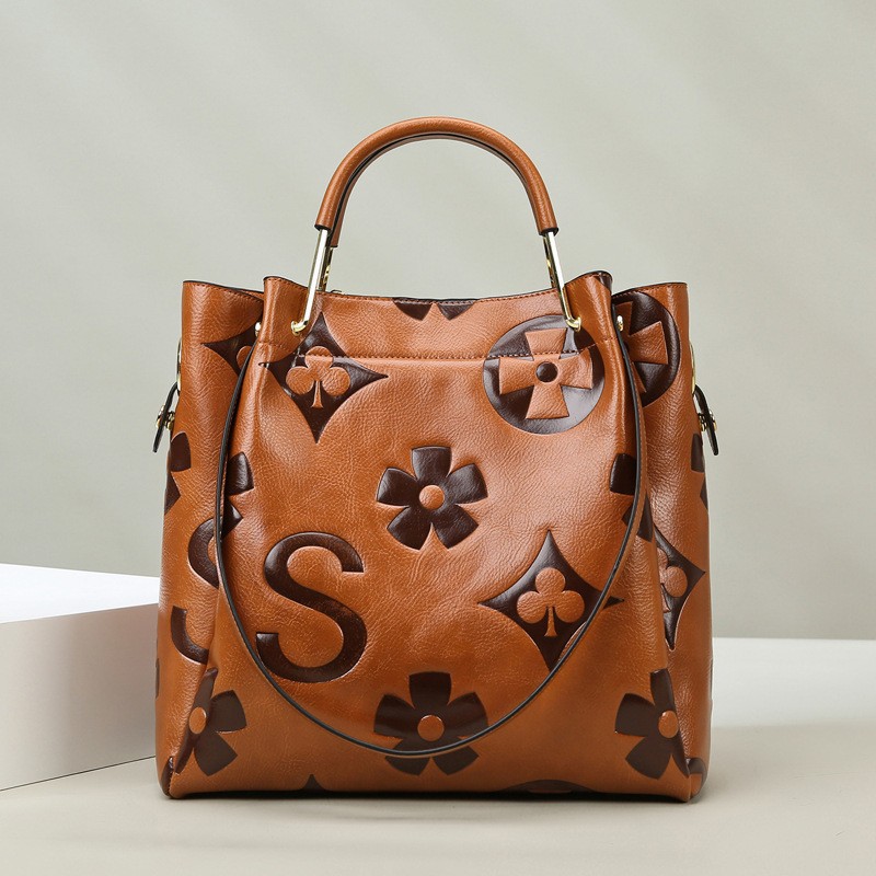 Women's new bucket bag senior sense of fashion embossed handbag large capacity sub mother shoulder bag